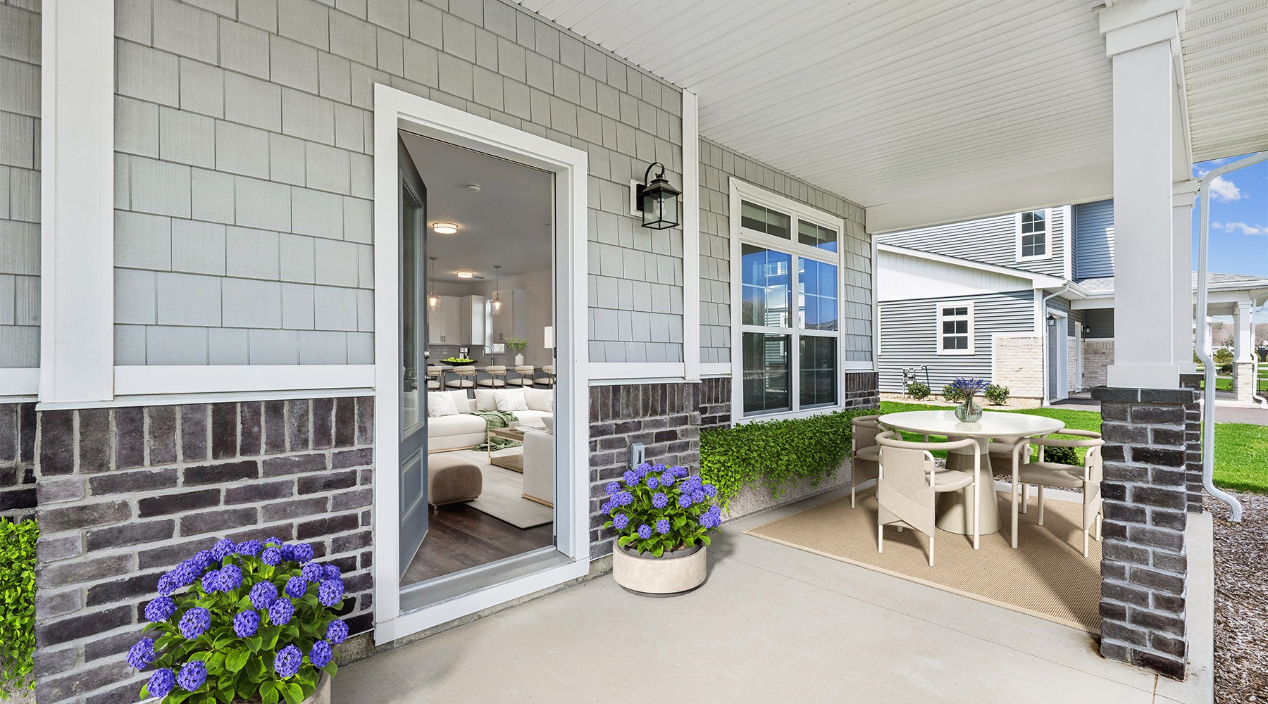 Find your perfect fit at The Arboretum a patio with a table chairs and flowers